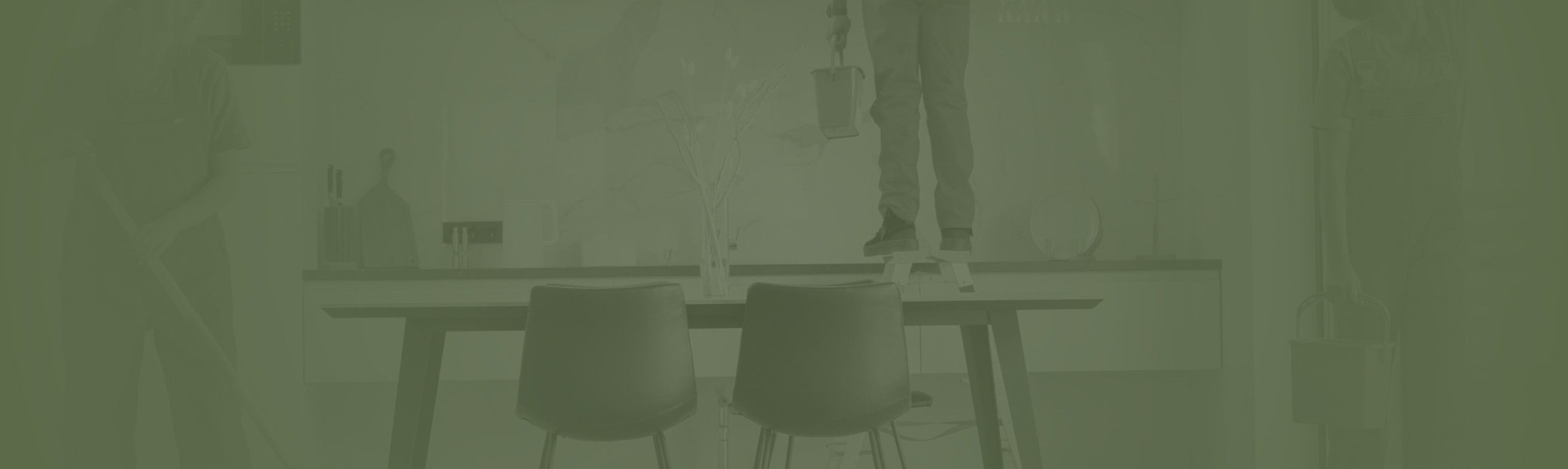 A table with two chairs in front of it